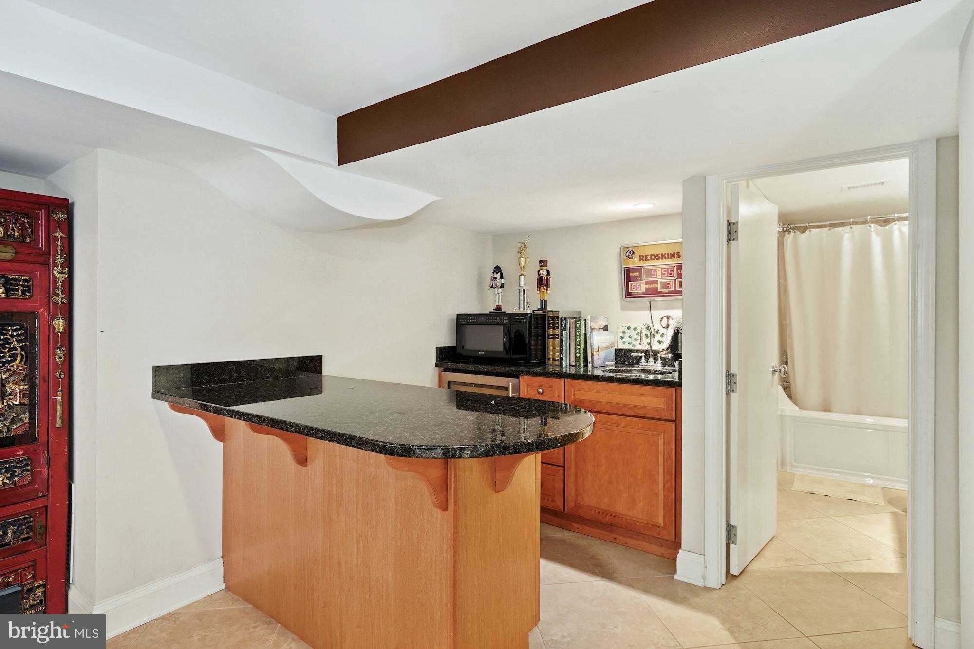 2707 34th Place Northwest Washington, DC 20007 - Photo 26 of 32 Lower level wet-bar