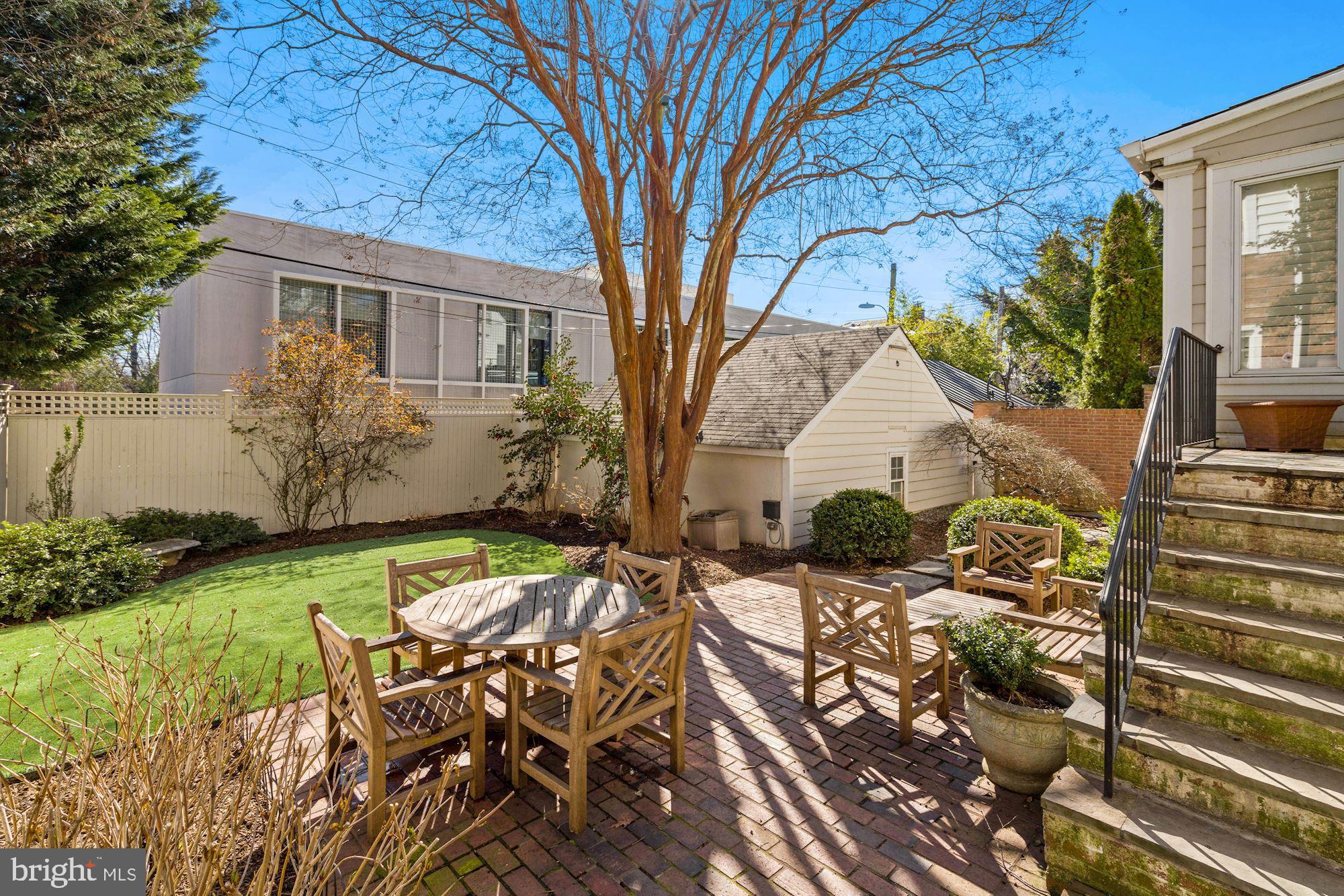 2707 34th Place Northwest Washington, DC 20007 - Photo 29 of 32 Backyard with hardscape and detached garage