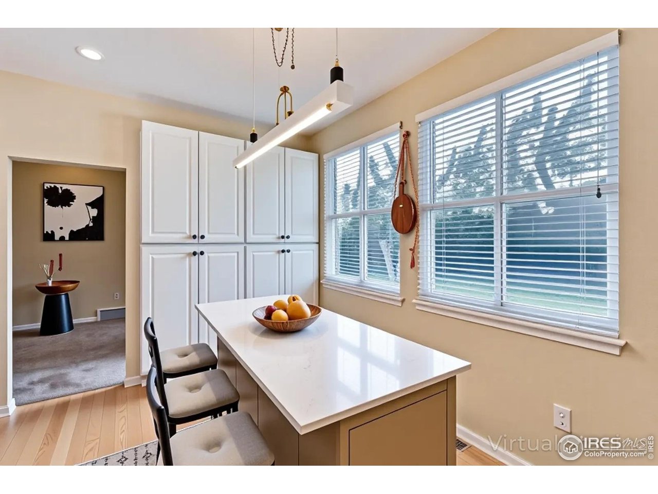 2834 Blue Jay Way Lafayette, CO 80026 - Photo 12 of 47 a view of a living room and dining room