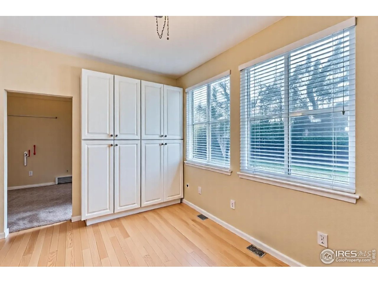 2834 Blue Jay Way Lafayette, CO 80026 - Photo 13 of 47 a view of an empty room with a window