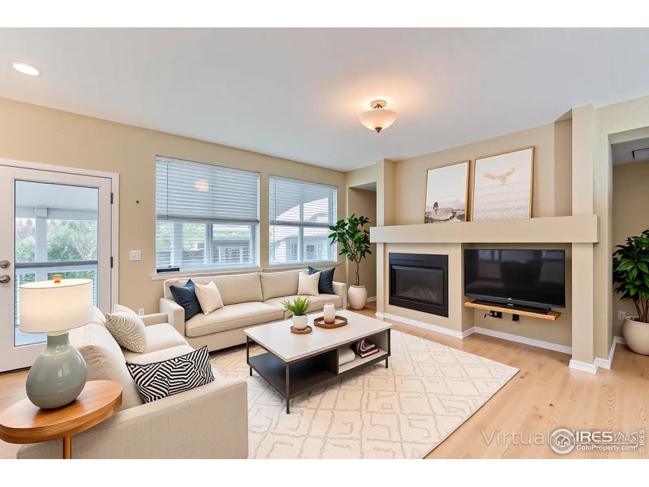 2834 Blue Jay Way Lafayette, CO 80026 - Photo 14 of 47 a living room with furniture and a fireplace