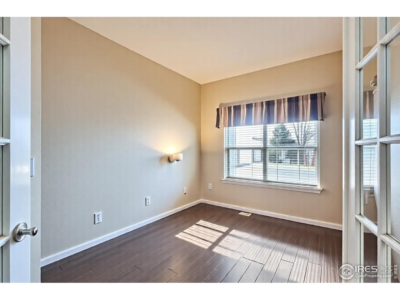 2834 Blue Jay Way Lafayette, CO 80026 - Photo 17 of 47 a view of an empty room with a window