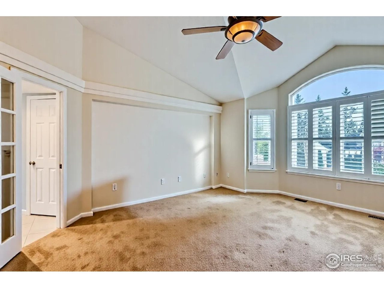 2834 Blue Jay Way Lafayette, CO 80026 - Photo 19 of 47 a view of an empty room with a window