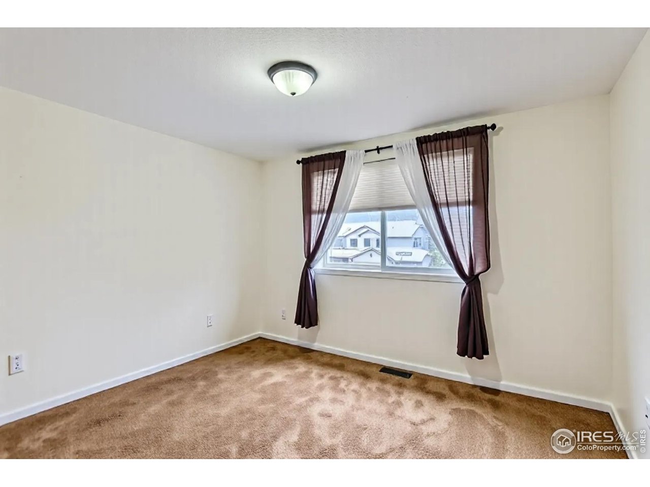 2834 Blue Jay Way Lafayette, CO 80026 - Photo 28 of 47 a view of empty room with window