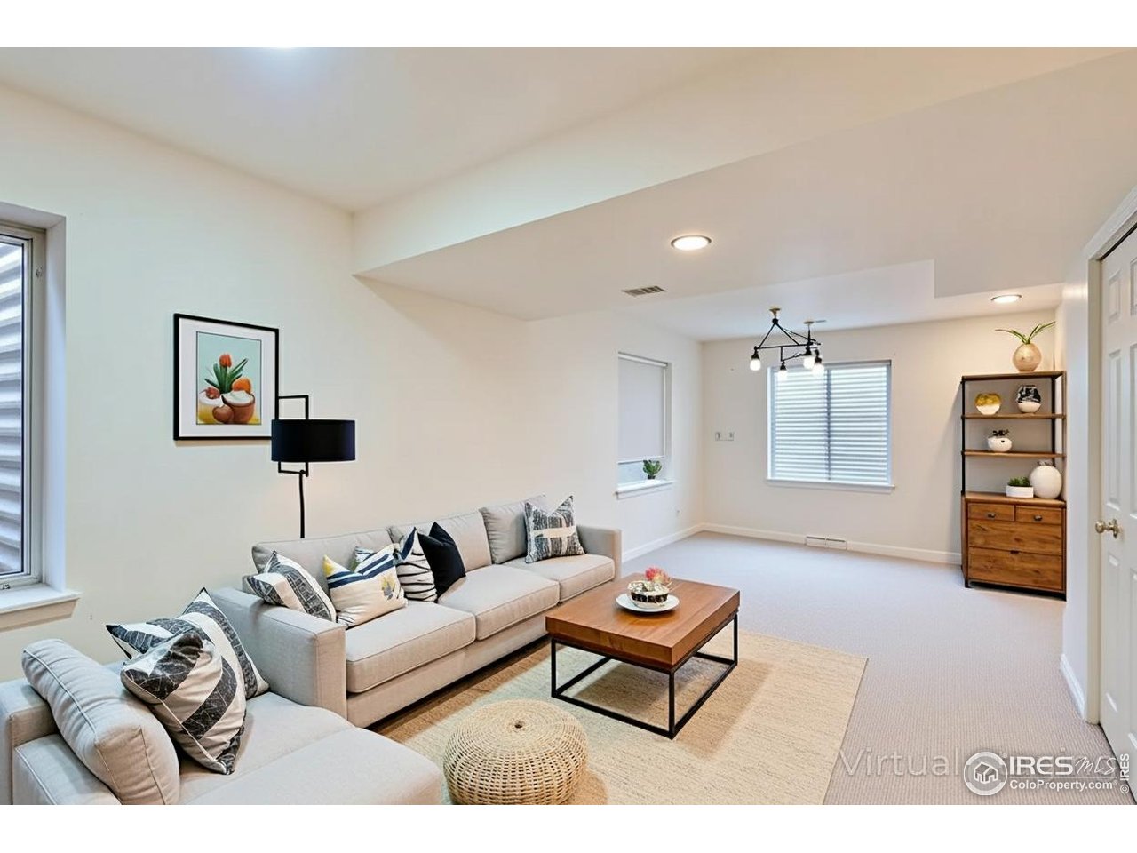 2834 Blue Jay Way Lafayette, CO 80026 - Photo 32 of 47 a living room with furniture and wooden floor