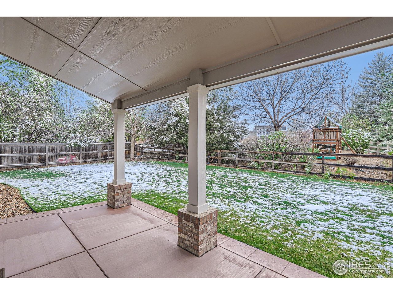 2834 Blue Jay Way Lafayette, CO 80026 - Photo 36 of 47 a view of a porch with a yard