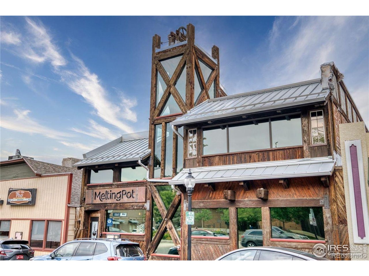2834 Blue Jay Way Lafayette, CO 80026 - Photo 43 of 47 a front view of a building with parking area