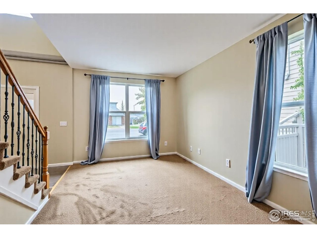 2834 Blue Jay Way Lafayette, CO 80026 - Photo 6 of 47 a view of an empty room with a window
