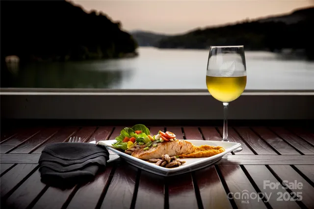 a utility room with a bed and a table