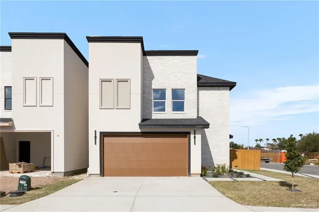 a front view of a house with a porch