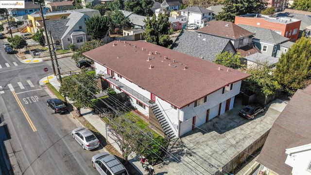 an aerial view of a house with outdoor space