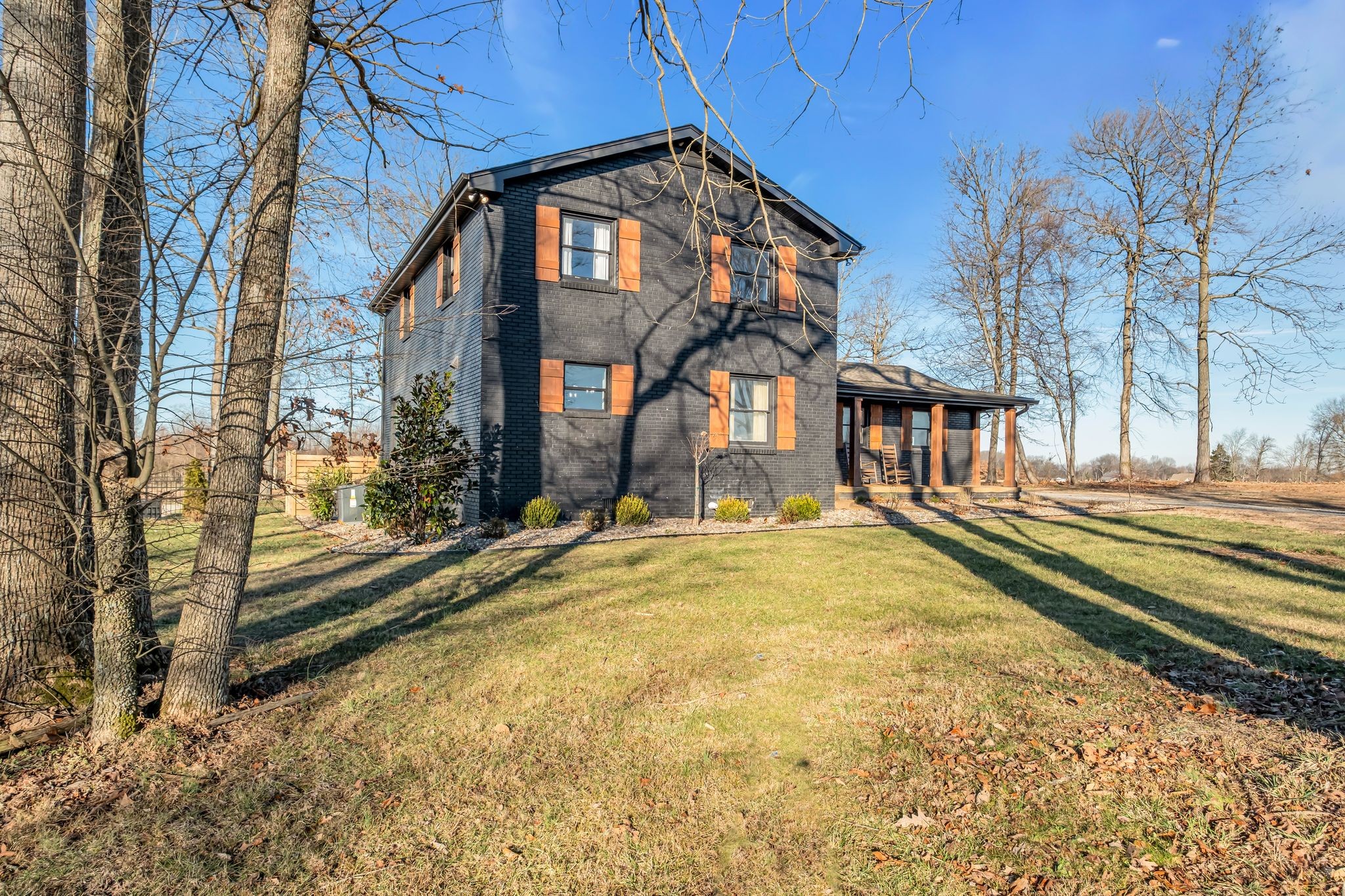 1447 Maxwell Branch Road Cottontown, TN 37048 - Photo 13 of 55 a front view of a house with a yard
