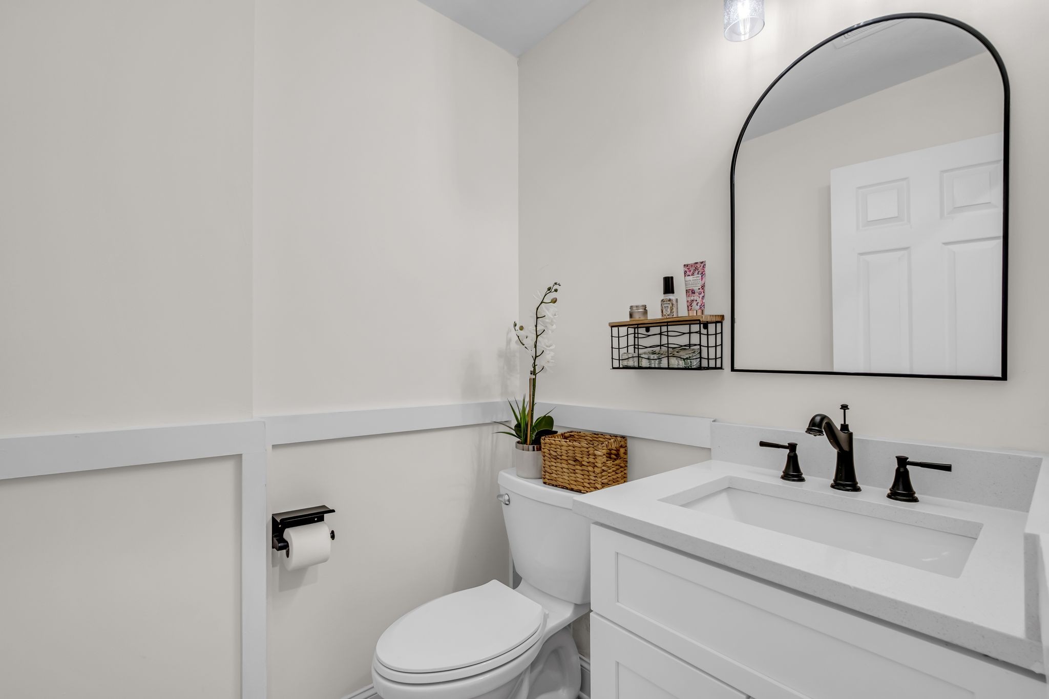 1447 Maxwell Branch Road Cottontown, TN 37048 - Photo 14 of 55 a bathroom with a sink a toilet and mirror