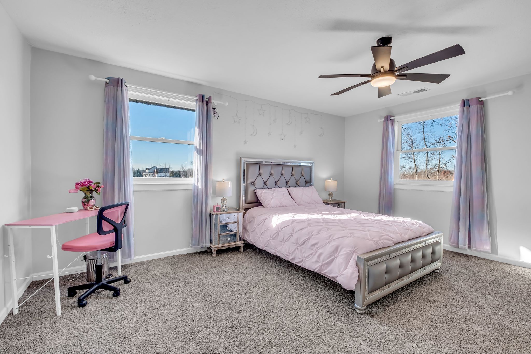 1447 Maxwell Branch Road Cottontown, TN 37048 - Photo 15 of 55 a bedroom with a bed a table and chair