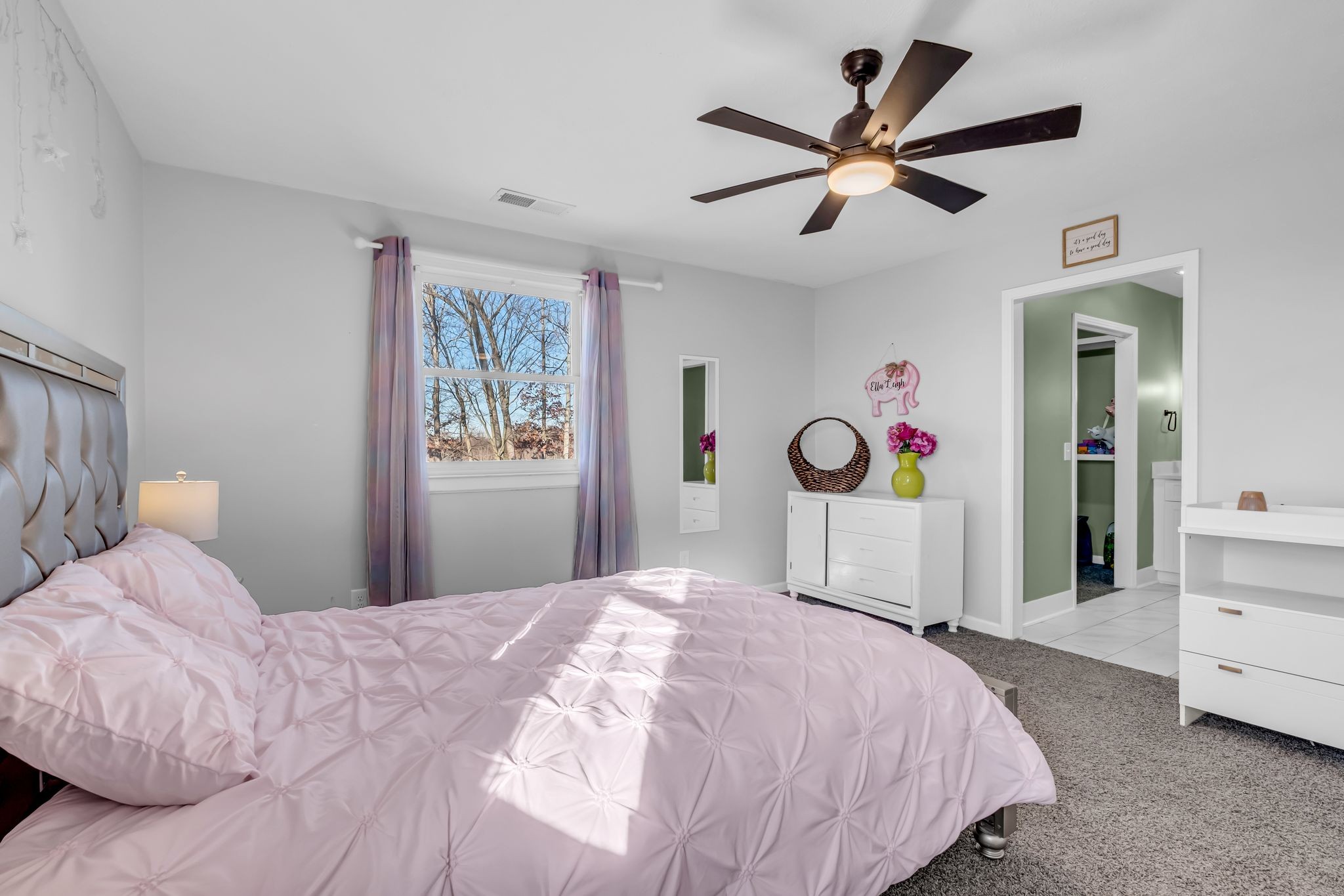 1447 Maxwell Branch Road Cottontown, TN 37048 - Photo 17 of 55 a bedroom with a bed and a cabinets