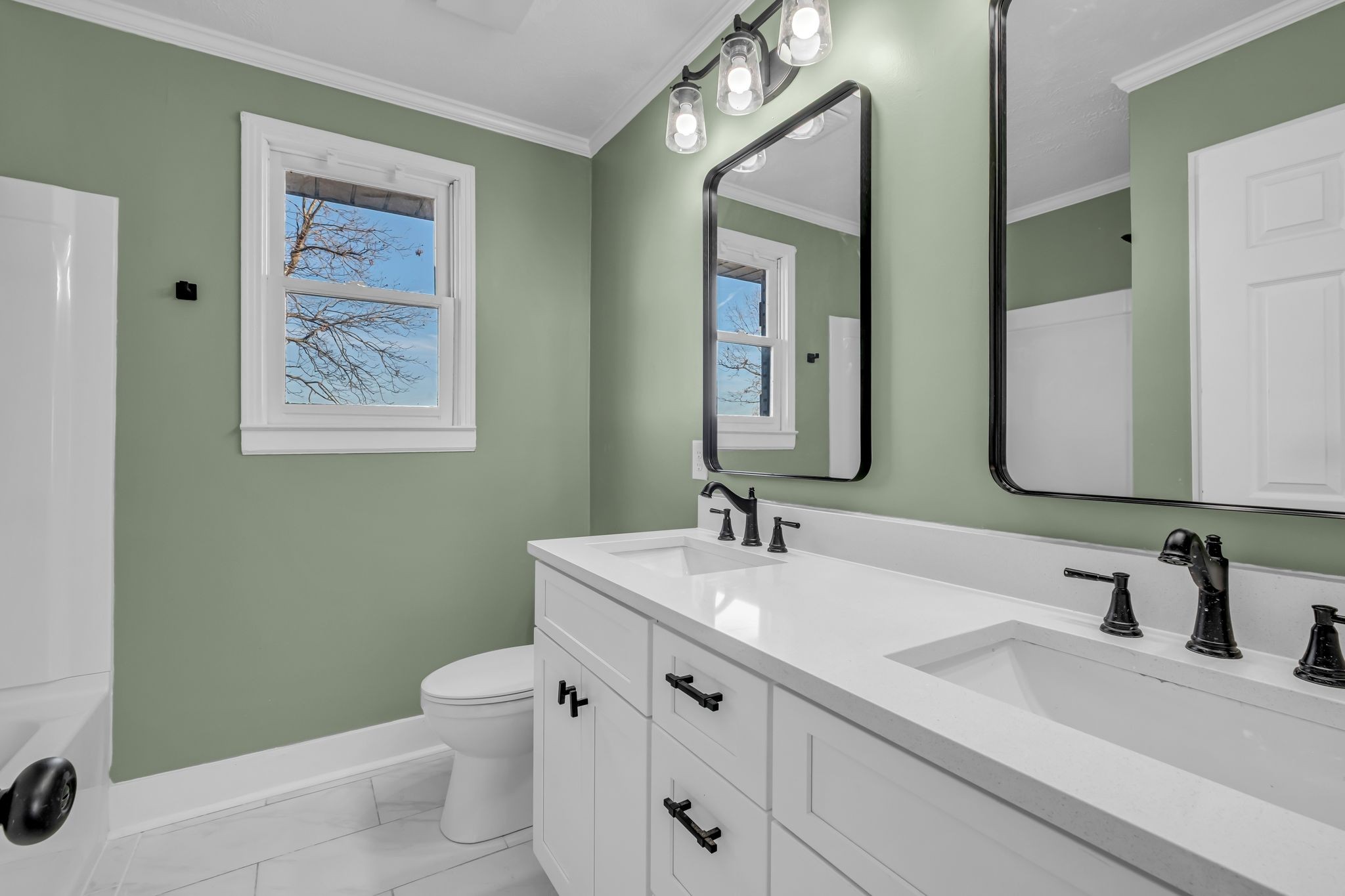 1447 Maxwell Branch Road Cottontown, TN 37048 - Photo 25 of 55 a bathroom with a double vanity sink mirror and toilet