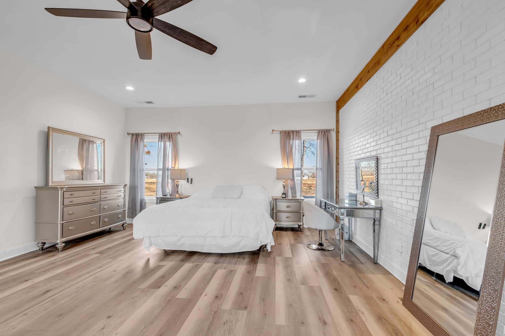 1447 Maxwell Branch Road Cottontown, TN 37048 - Photo 27 of 55 a living room with furniture and a wooden floor