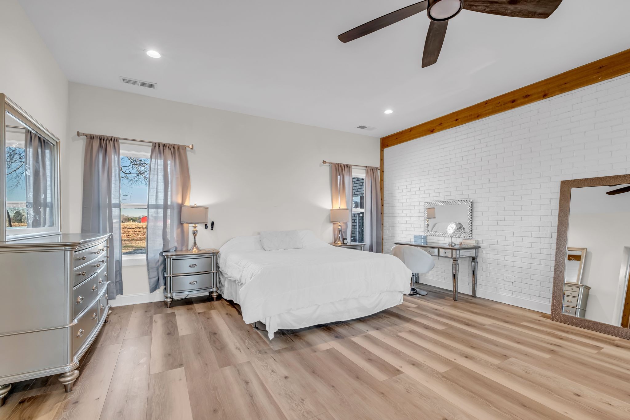 1447 Maxwell Branch Road Cottontown, TN 37048 - Photo 28 of 55 a room with a bed and furniture