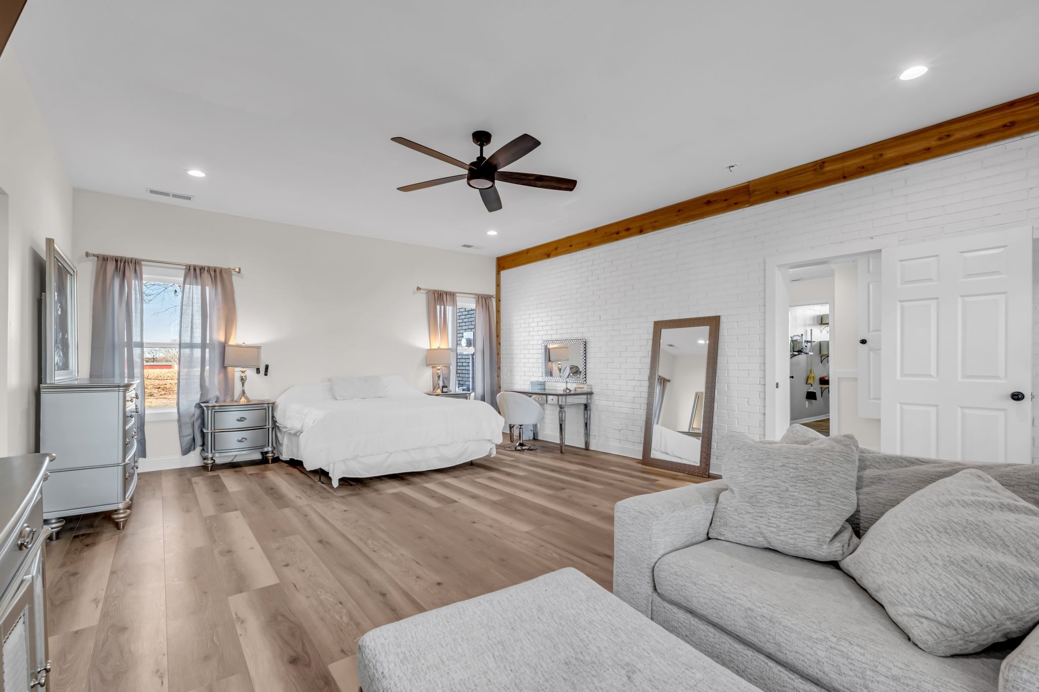 1447 Maxwell Branch Road Cottontown, TN 37048 - Photo 29 of 55 a living room with furniture and a wooden floor