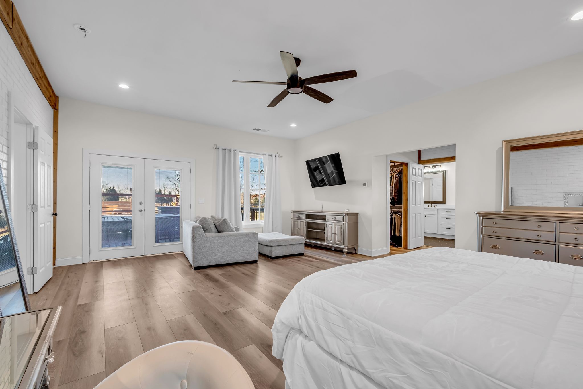 1447 Maxwell Branch Road Cottontown, TN 37048 - Photo 30 of 55 a bedroom with furniture and a fireplace