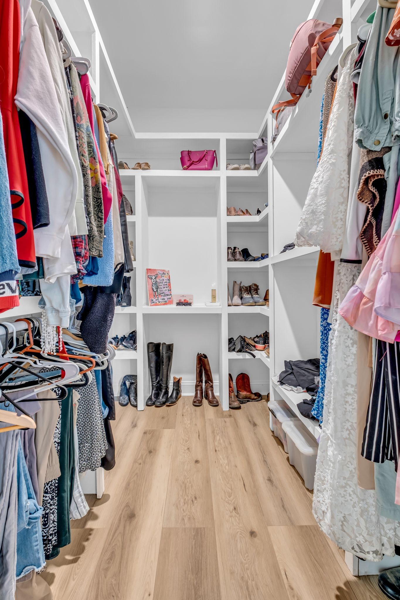 1447 Maxwell Branch Road Cottontown, TN 37048 - Photo 34 of 55 a view of walk in closet with clothes and shoes