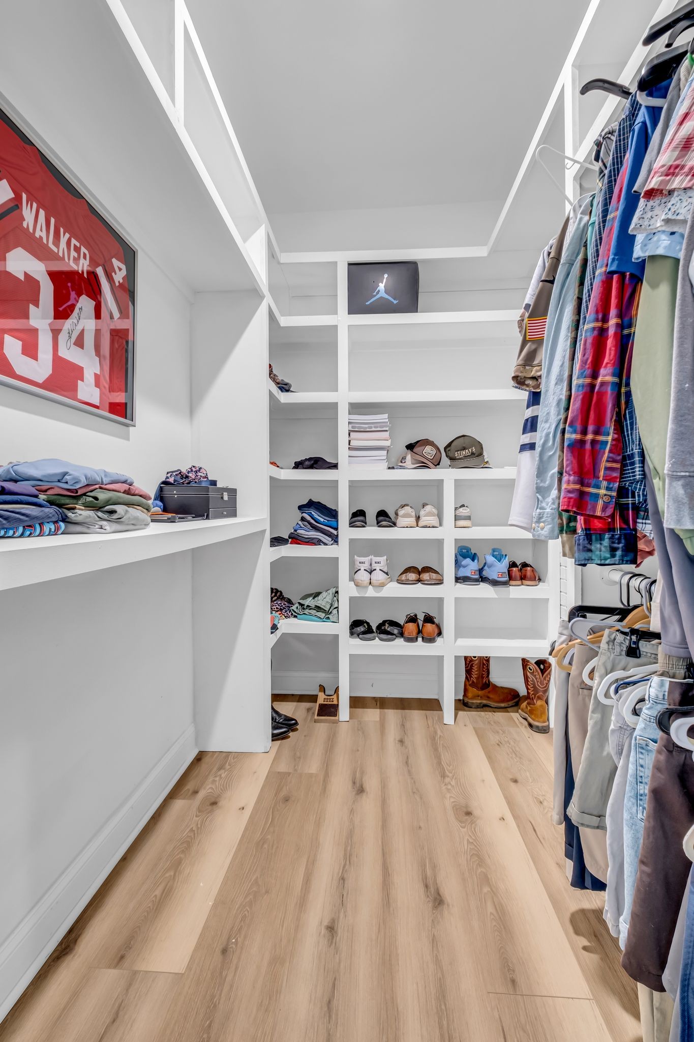 1447 Maxwell Branch Road Cottontown, TN 37048 - Photo 35 of 55 a view of walk in closet with clothes and shoes