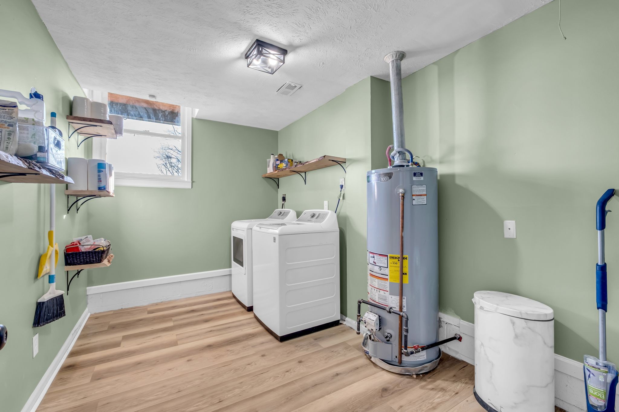 1447 Maxwell Branch Road Cottontown, TN 37048 - Photo 36 of 55 a bathroom with a sink mirror and toilet