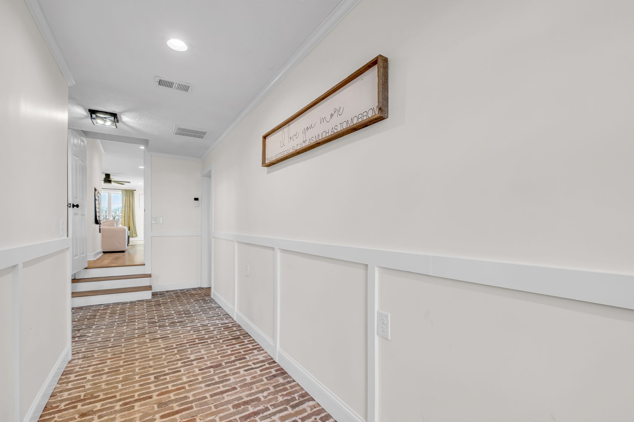 1447 Maxwell Branch Road Cottontown, TN 37048 - Photo 38 of 55 a view of a hallway with wooden floor and staircase