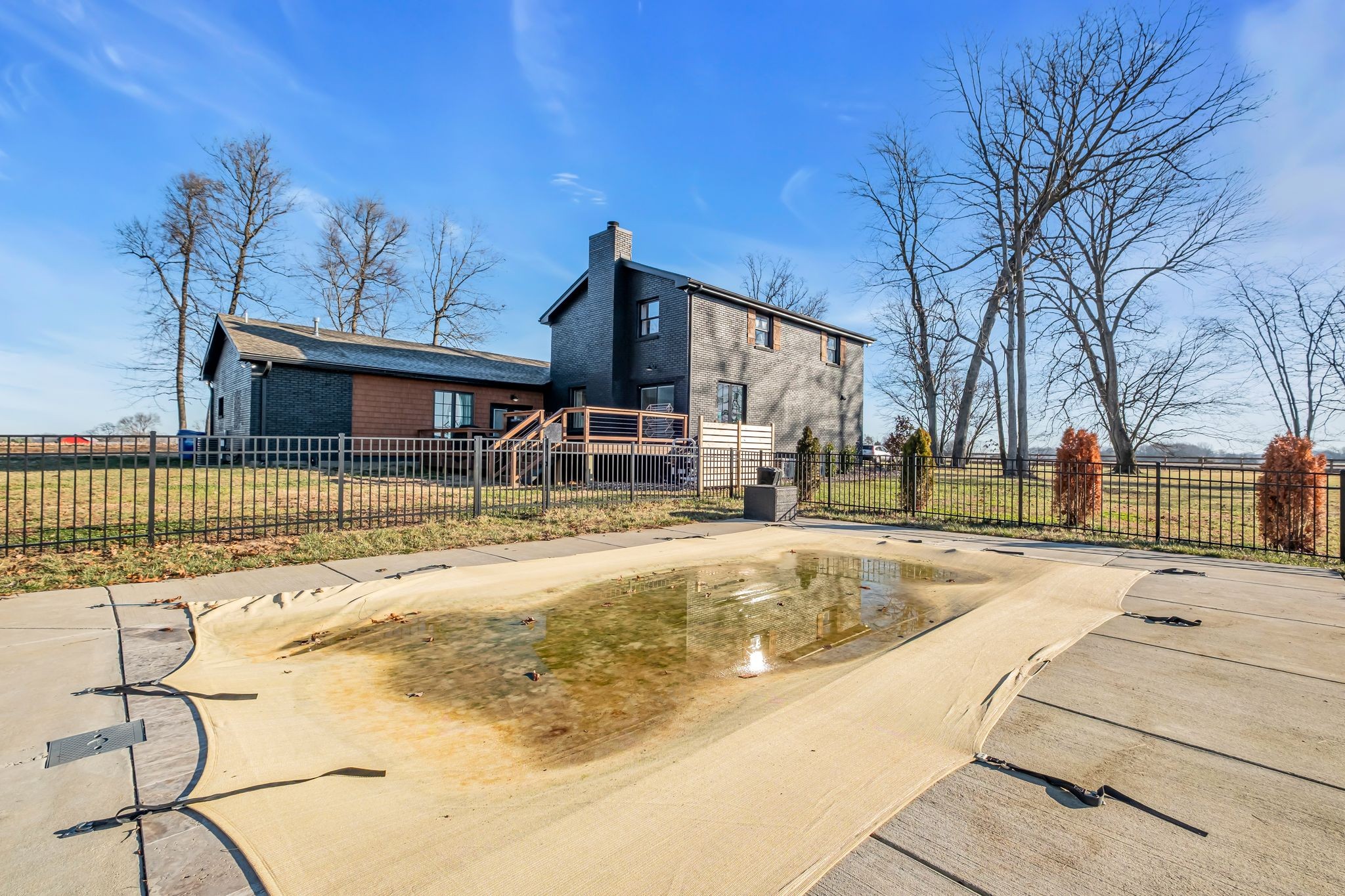 1447 Maxwell Branch Road Cottontown, TN 37048 - Photo 46 of 55 a swimming pool with outdoor seating and yard