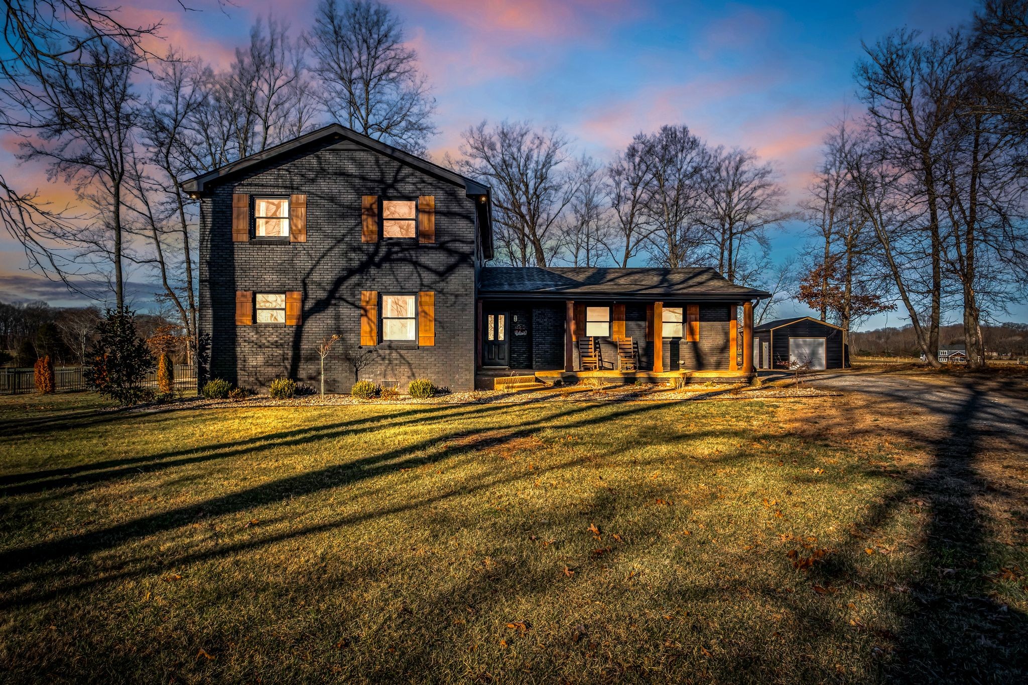 1447 Maxwell Branch Road Cottontown, TN 37048 - Photo 48 of 55 a front view of a house with a yard
