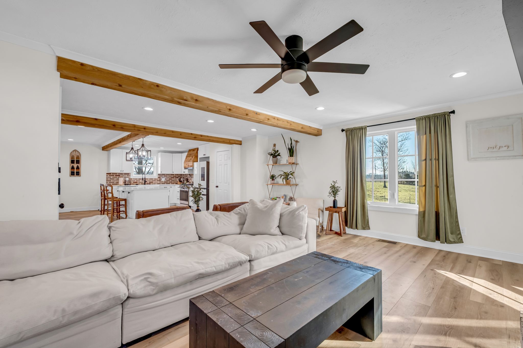 1447 Maxwell Branch Road Cottontown, TN 37048 - Photo 8 of 55 a living room with furniture and a large window