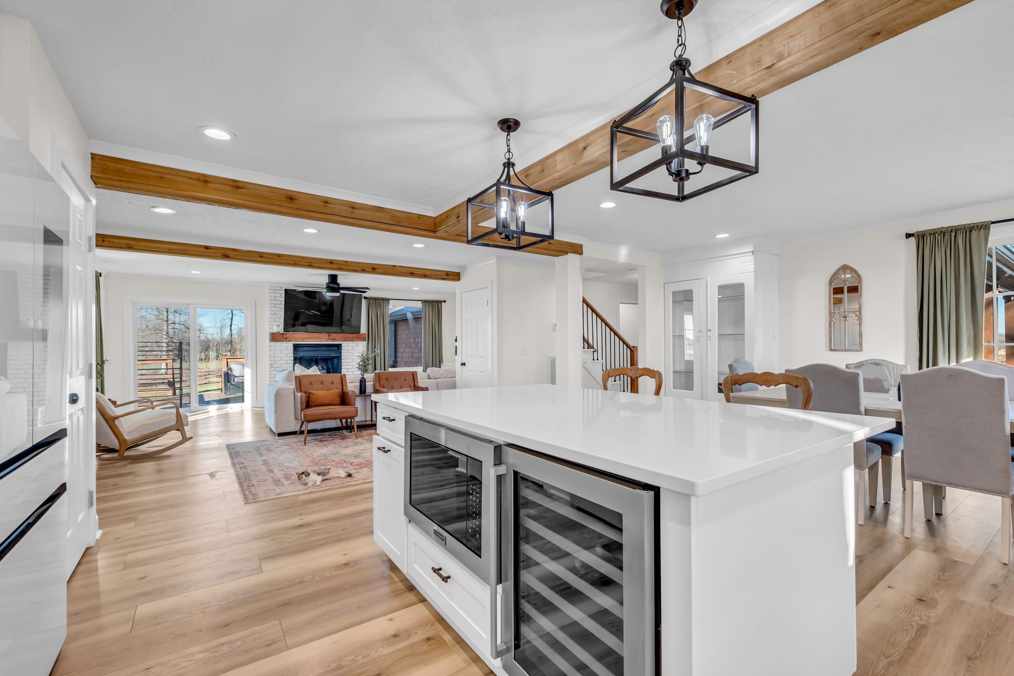 1447 Maxwell Branch Road Cottontown, TN 37048 - Photo 10 of 55 a living room with stainless steel appliances kitchen island furniture and a view of living room