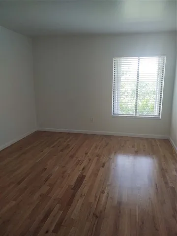 a bathroom with a sink vanity and toilet