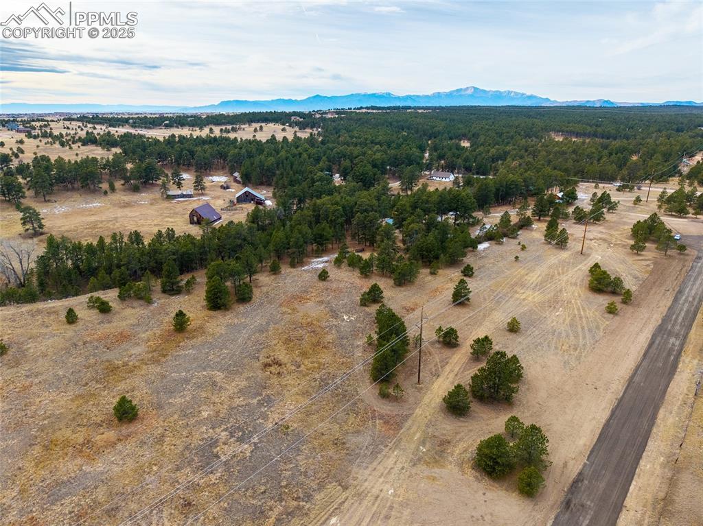 12015 Grandin Point Elbert, CO 80106 - Photo 4 of 5 a view of a lake with a mountain