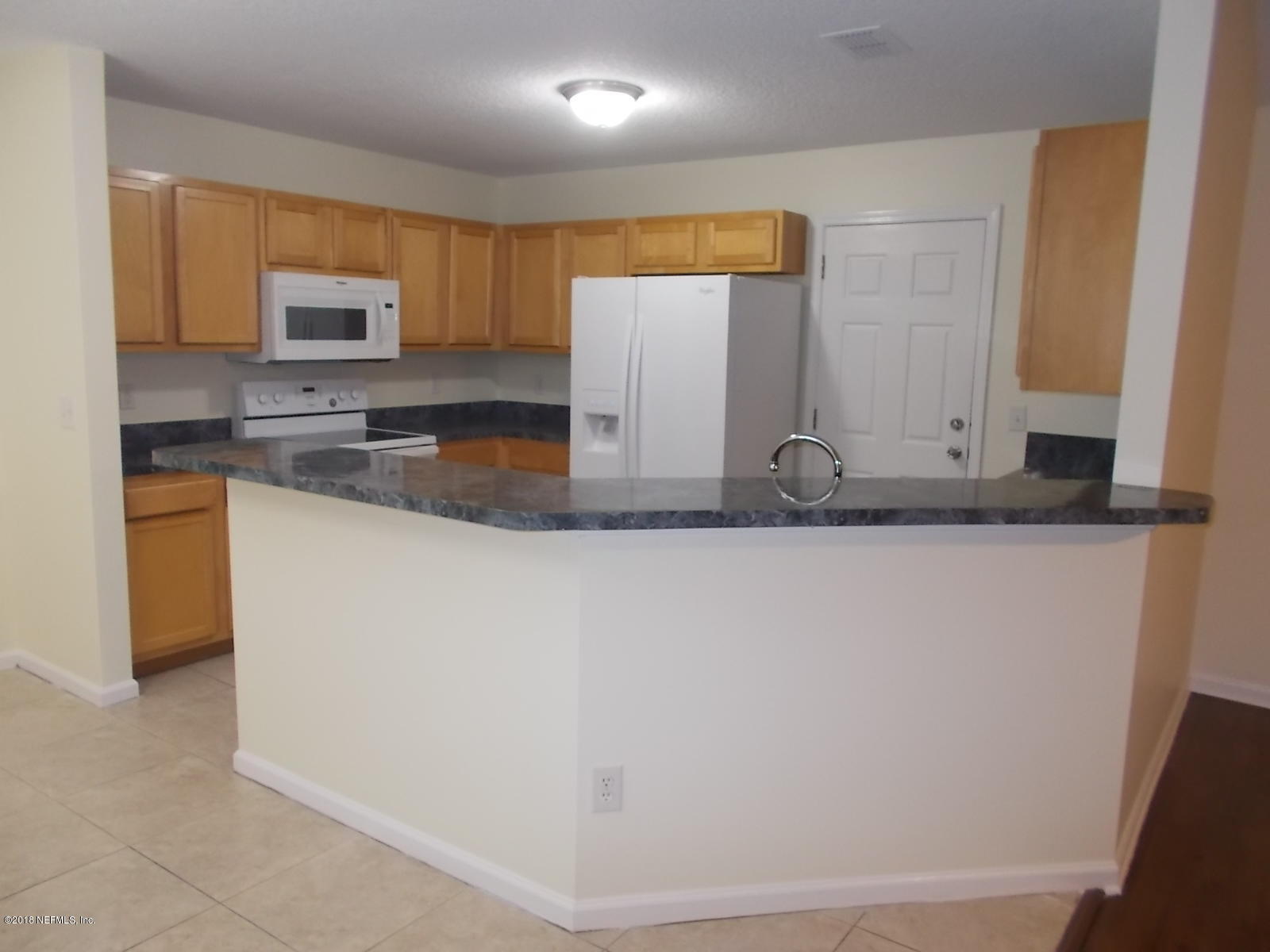 8440 Metto Road Jacksonville, FL 32244 - Photo 17 of 30 View into Kitchen