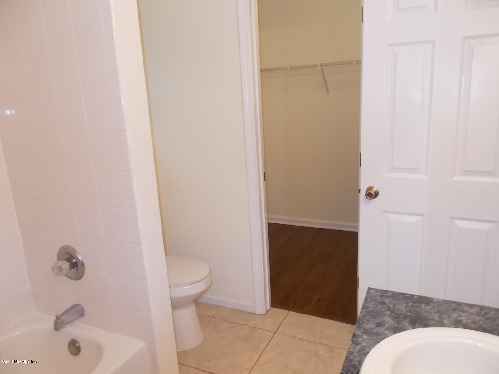 8440 Metto Road Jacksonville, FL 32244 - Photo 29 of 30 Master Bath to Closet