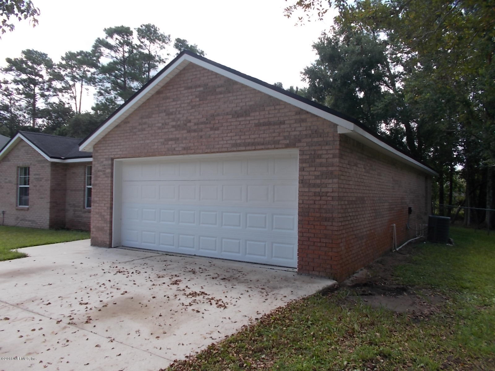 8440 Metto Road Jacksonville, FL 32244 - Photo 4 of 30 Garage Exterior