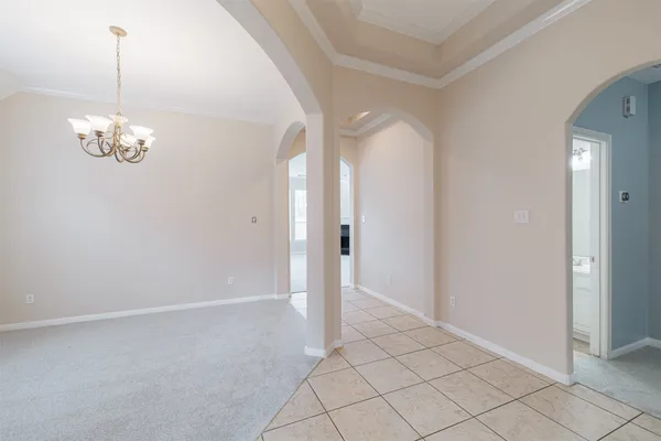 a view of a chandelier in a room