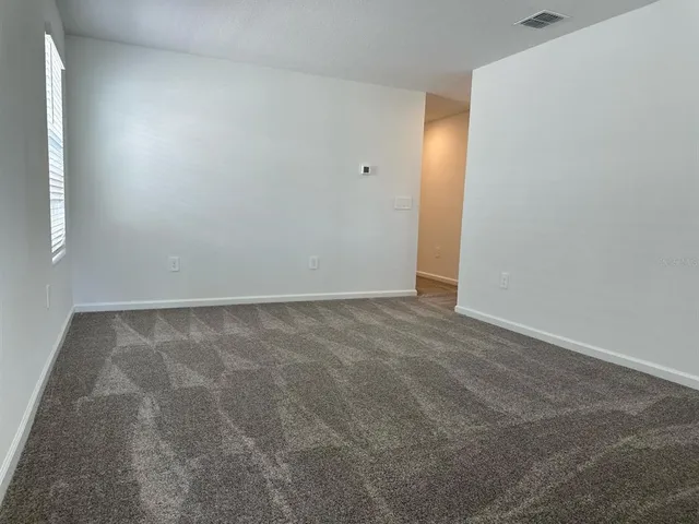 a view of a lake with a big yard