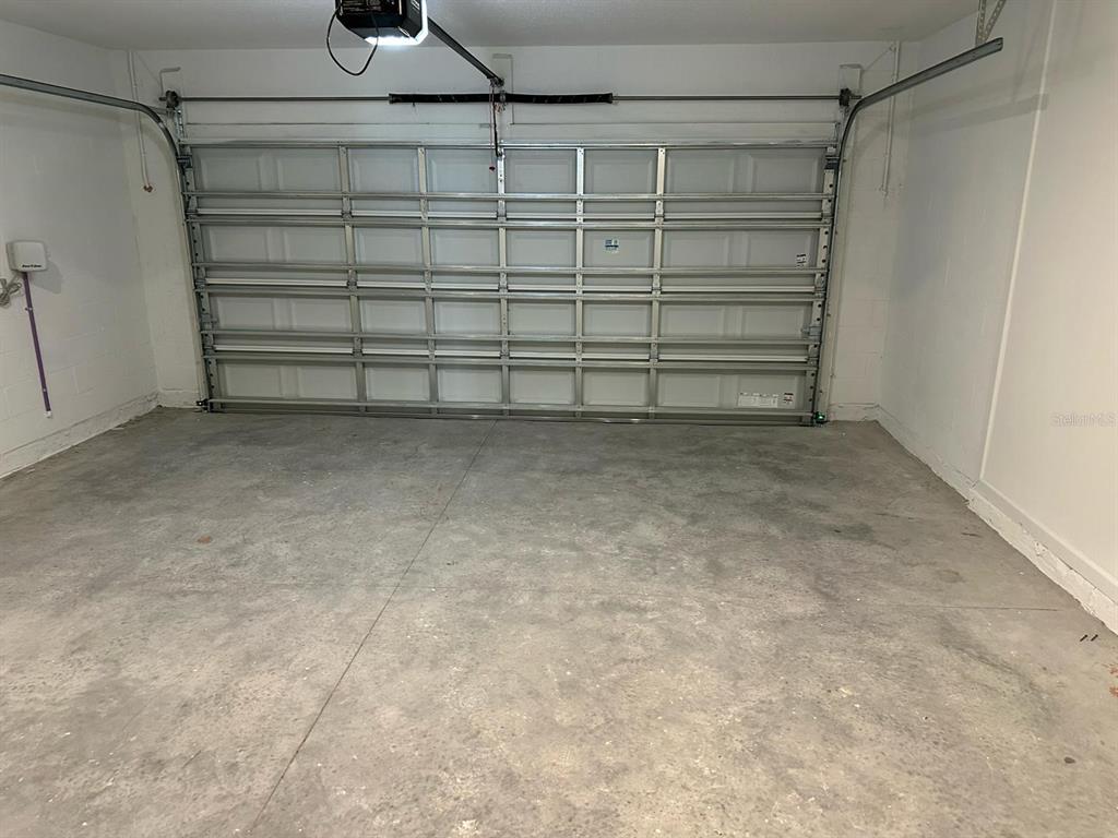 417 Cedar Key Street Davenport, FL 33837 - Photo 38 of 58 a view of a room with storage