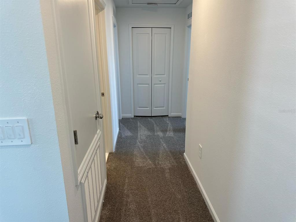 417 Cedar Key Street Davenport, FL 33837 - Photo 56 of 58 a view of a hallway