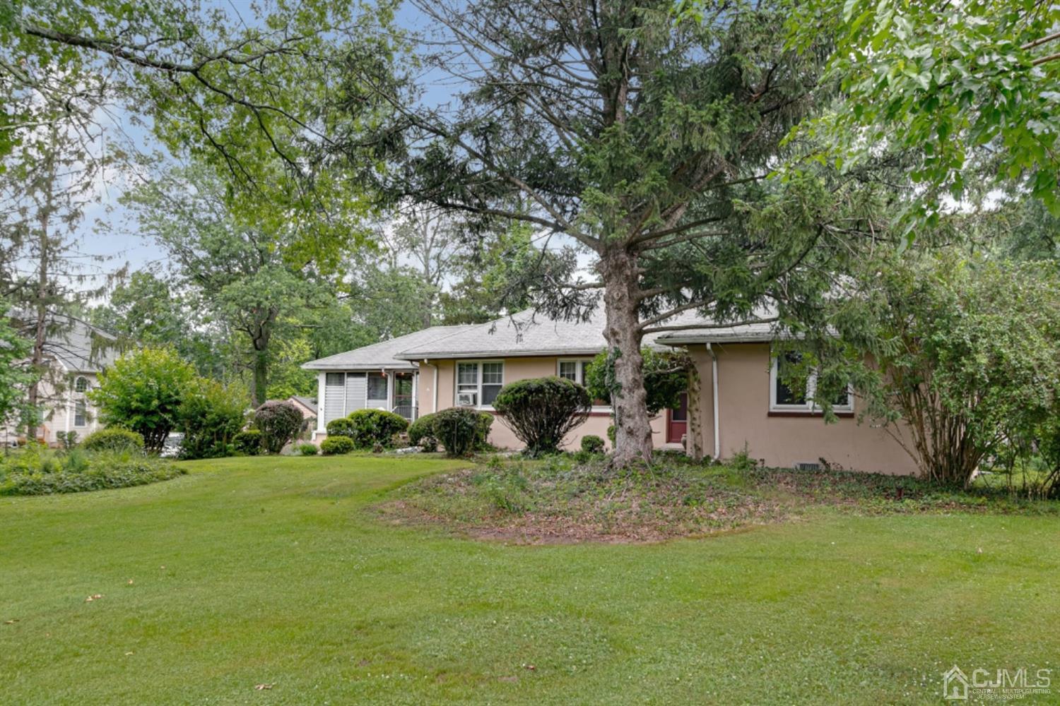 327 Plainfield Road Edison, NJ 08820 - Photo 8 of 19 a view of a house with a yard
