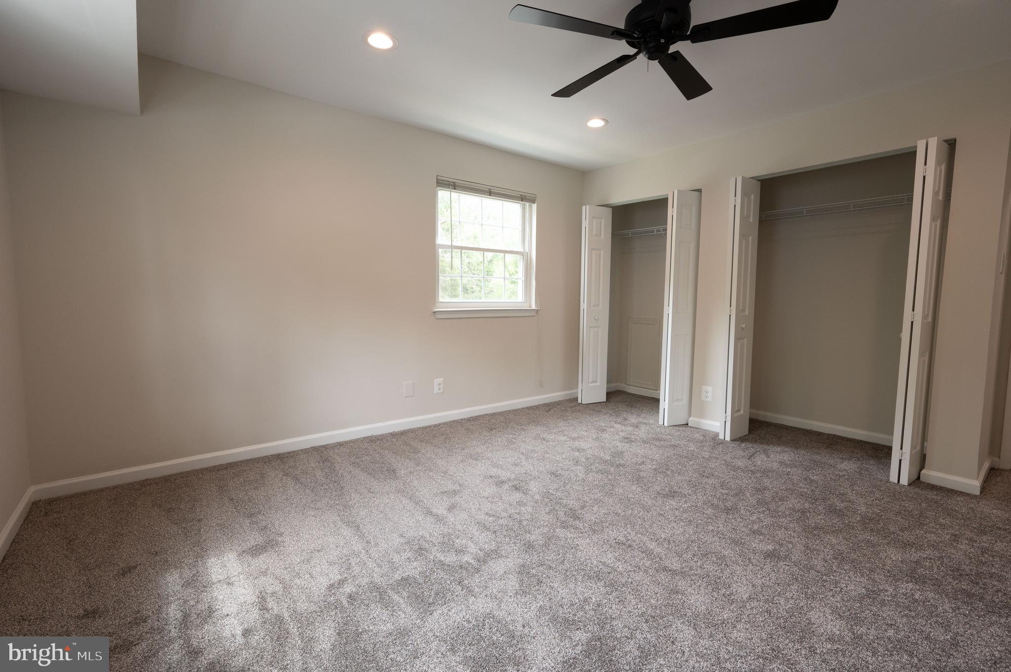 7097 Spring Garden Drive, Unit 101 Springfield, VA 22150 - Photo 12 of 17 a view of an empty room and a window