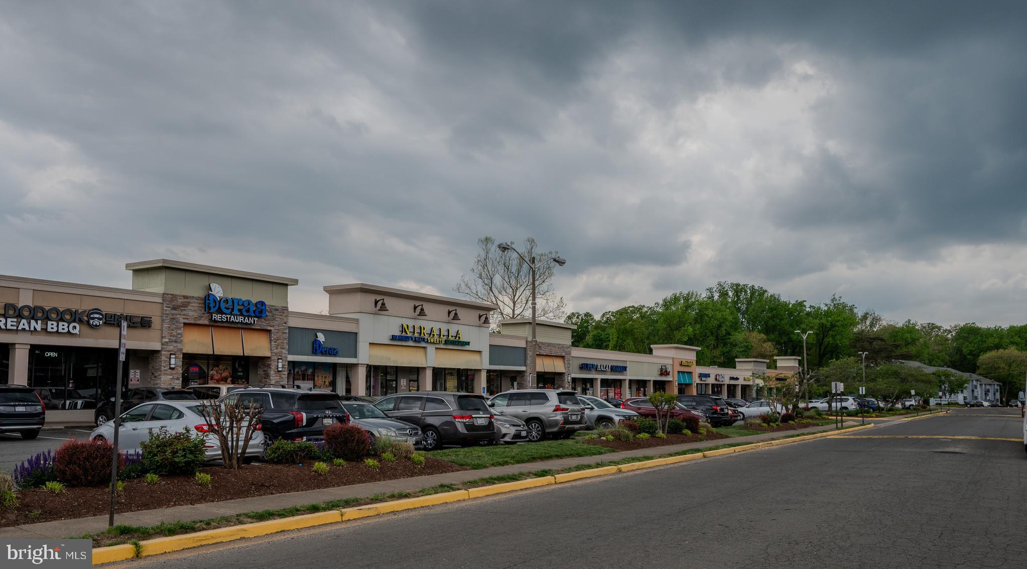 7097 Spring Garden Drive, Unit 101 Springfield, VA 22150 - Photo 17 of 17 a view of a street with cars