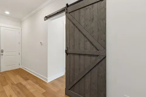 a bathroom with a double vanity sink a mirror and a shower