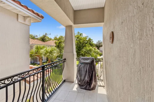 a view of a house with swimming pool and sitting area
