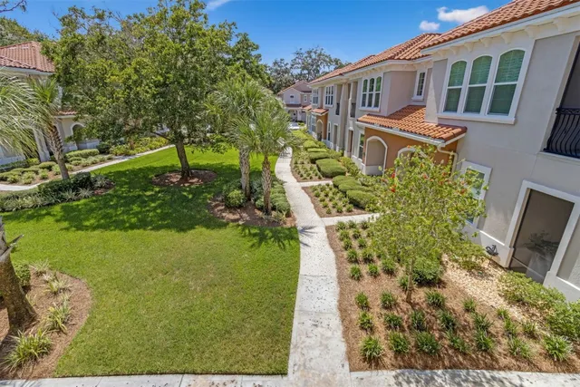 a kitchen with a stove a sink and a refrigerator