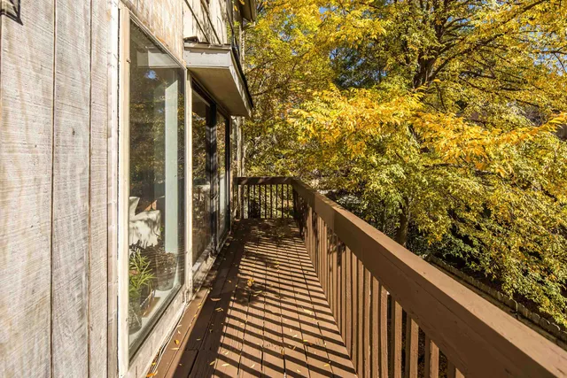 a picture of a bathroom with a refrigerator