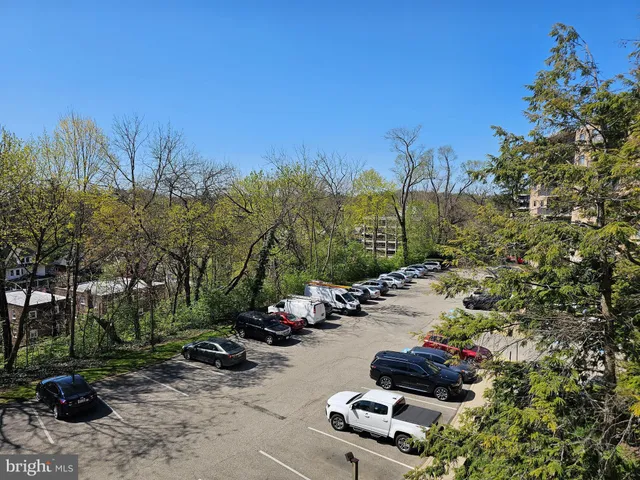 a view of a street with some trees