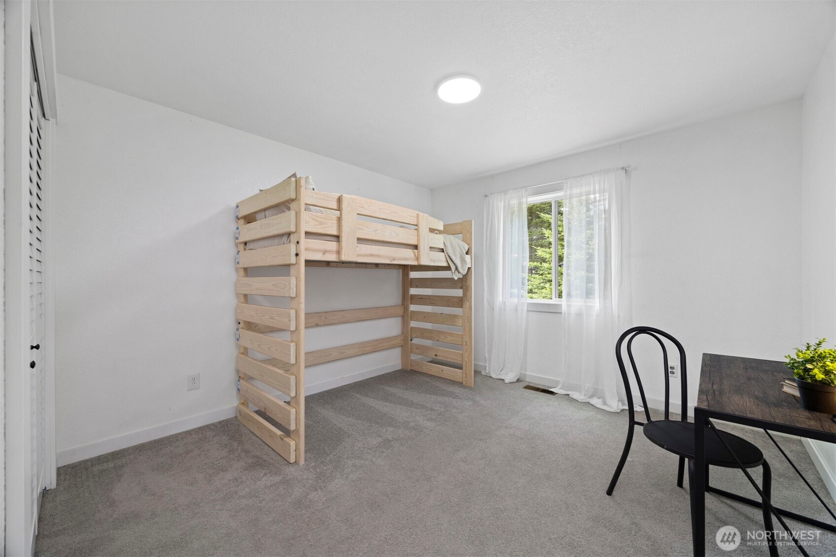 2403 East Hemmi Road Bellingham, WA 98226 - Photo 21 of 40 a view of a room with furniture and window